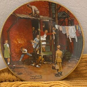 Norman Rockwell Plate with Red and Brown Hues